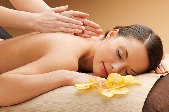 Guest receiving soothing Swedish oil massage therapy